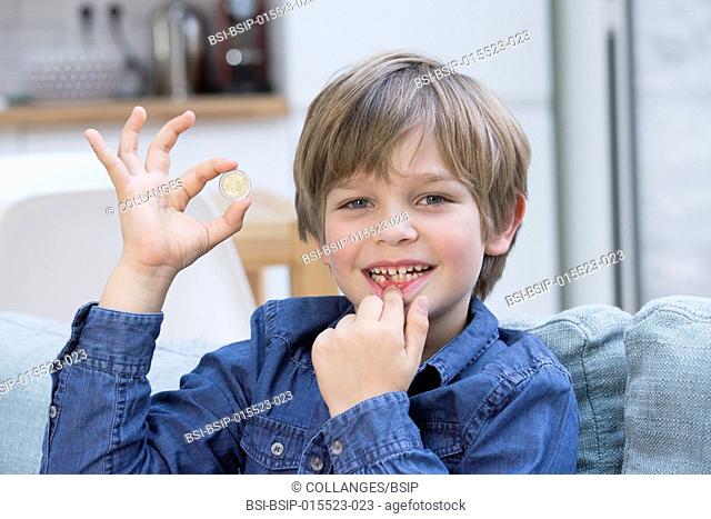 A child who has lost a tooth