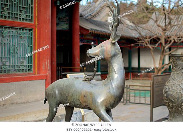 A Statue Of A Qilin Standing Before The Summer Pal