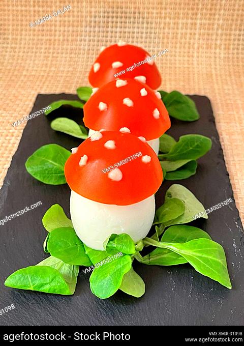 Spanish tapa made of egg and tomato as mushrooms. Spain