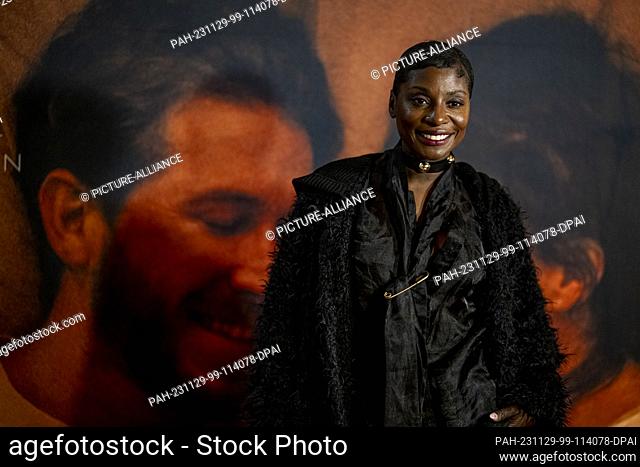 28 November 2023, Berlin: Nikeata Thompson, actress and choreographer, arrives on the red carpet at the premiere of the film ""Falling into Place"" in the Astor...