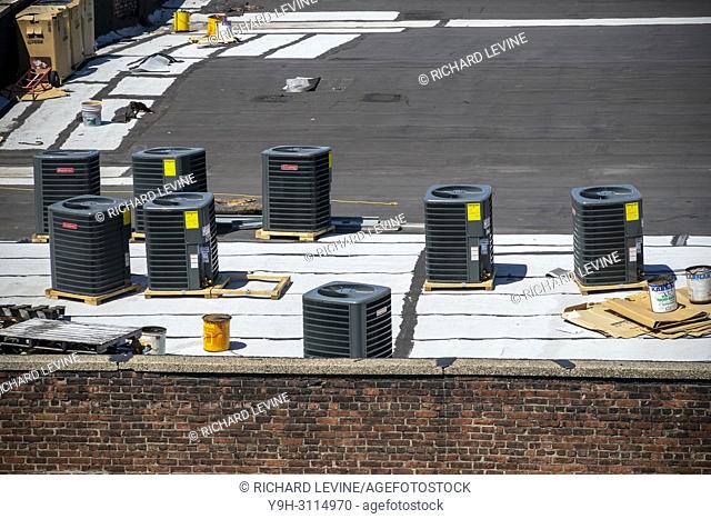 HVAC equipment waiting to be installed during a building renovation in Williamsburg, Brooklyn in New York on Sunday, April 22, 2018. (© Richard b