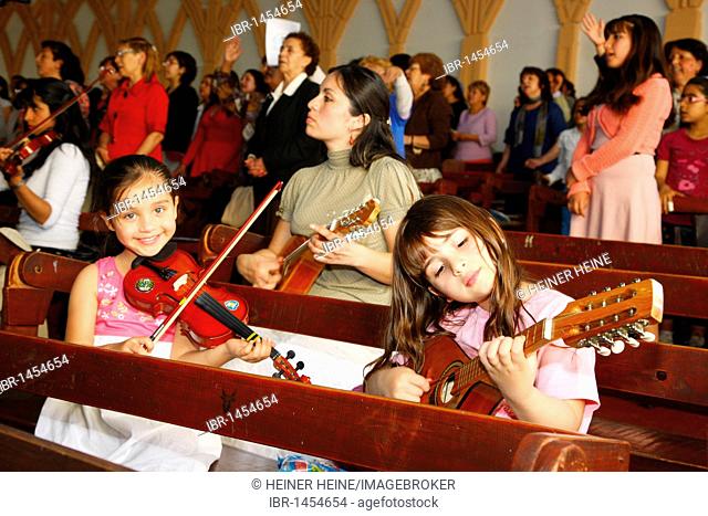 Girls playing music during church service, Catedral Evangelica de Chile, Pentecostal Church, Santiago de Chile, Chile, South America