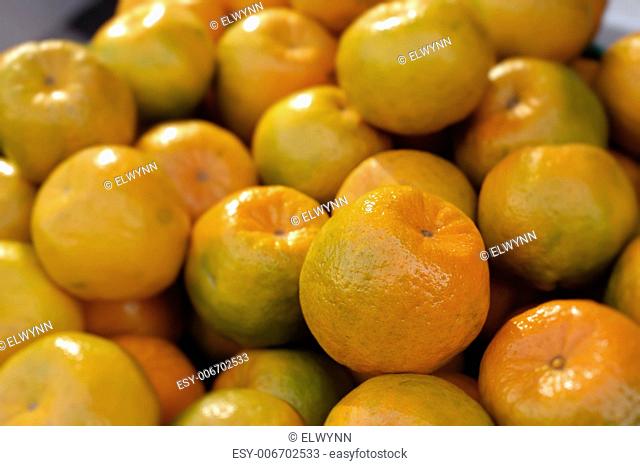 Tangerines in group, fresh fruit in orange color