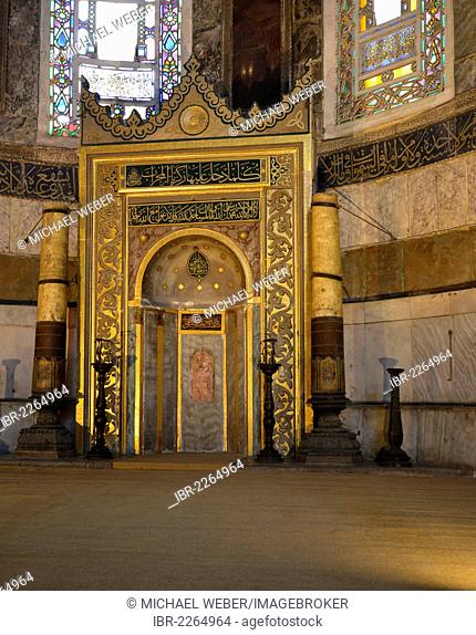 Interior view, Hagia Sophia, Ayasofya, Islamic prayer niche, mihrab, for Muslim ritual prayer, whitewashed mosaic of the Archangel Gabriel