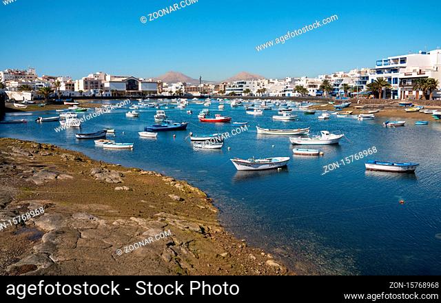 ARRECIFE, SPAIN - JANUARY 28, 2020: Panoramic image of the marina of Arrecife on a sunny day with clear sky on January 28, 2020 in Lanzarote, Spain