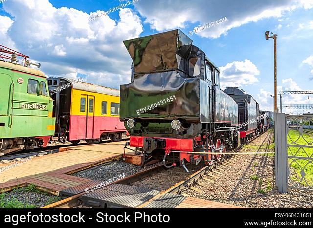 Moscow, Russia - August 14, 2021: Rare black retro steam locomotive. Exposition area of RZD railway vehicles at Rizhskaya station