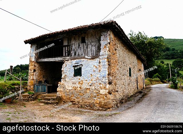 Traditional farm building in the valley in Asturias, Spain