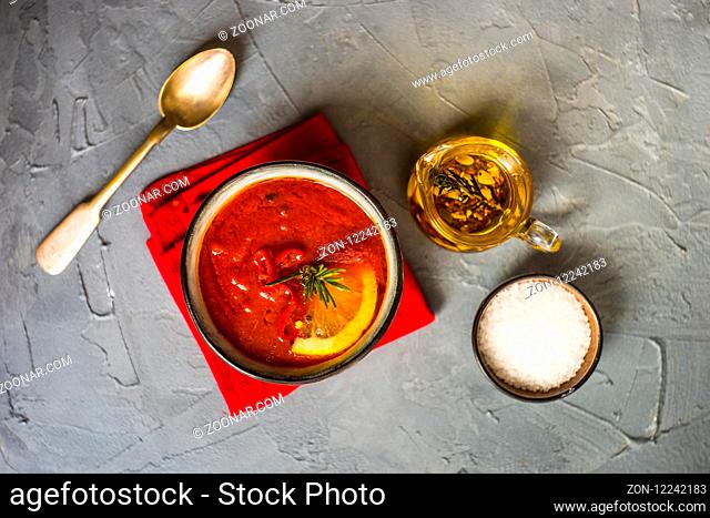 Traditional spanish tomato cream soup Gazpacho in ceramic bowl on concrete background with copy space