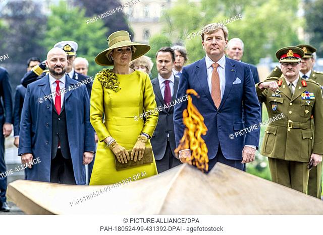 King Willem-Alexander and Queen Maxima of The Netherlands lay down a wreath at the Monument de la Solidarite Luxembourgeoise in Luxembourg 23 May 2018