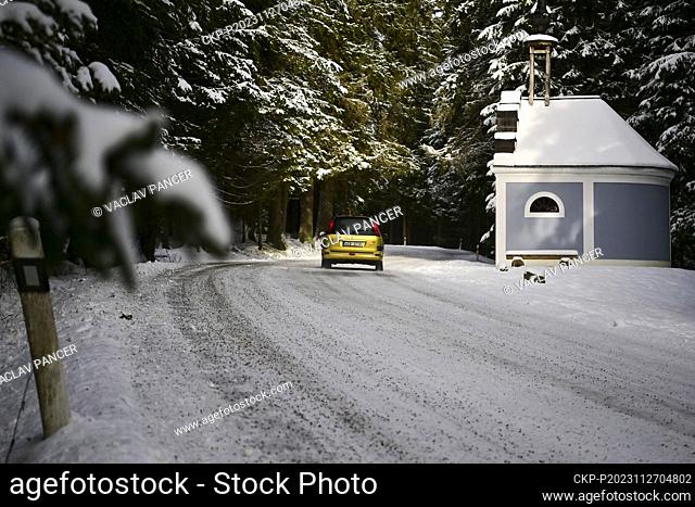 Chapel of the Stations of the Cross by the road near Borova Lada, 27 November 2023, Prachatice region. Roads in the higher altitudes in Bohemian Forest are...