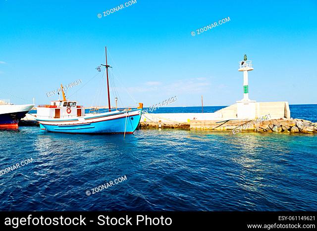 lighthouse in the mediterranean sea cruise greece island in santorini europe boat harbor and pier
