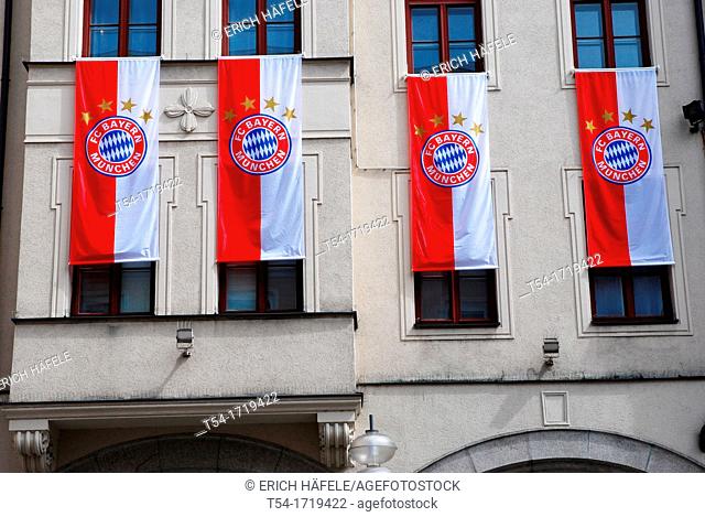 FC. Bayern Munich flags on a house in Munich
