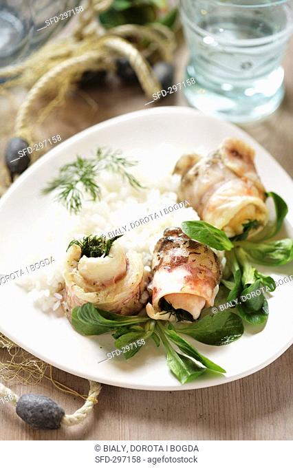 Sea bass rolls with dill and rice