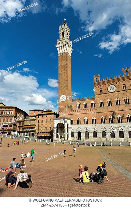 The Mangia Tower (Torre del Mangia), built in 1338-1348, on the Piazza del Campo in Siena, Tuscany region of Italy
