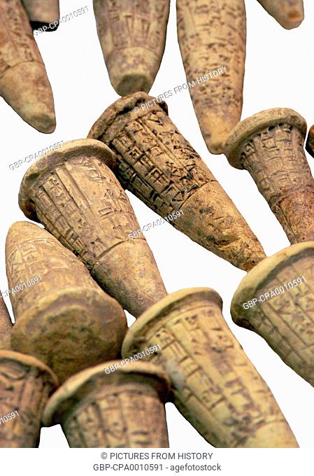 Iraq: Cuneiform-inscribed baked clay coins from the National Museum, Baghdad, c. 2, 600 BCE