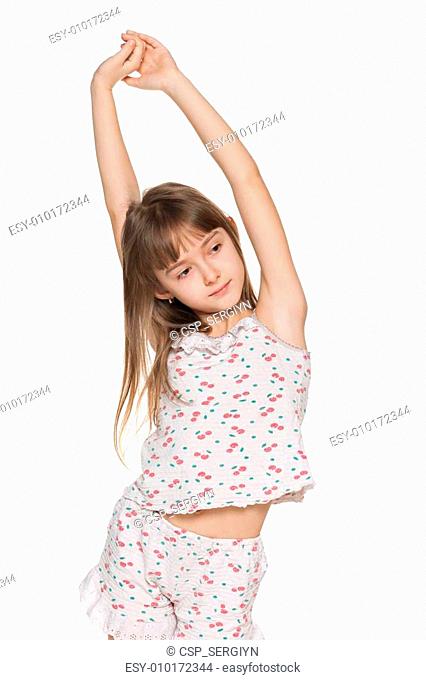 Young girl stretches himself