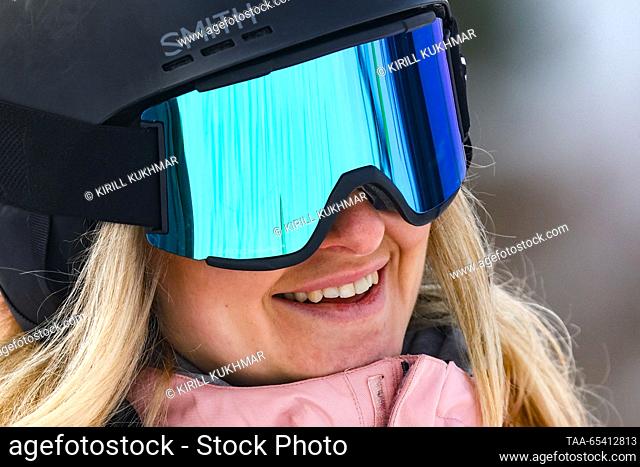 RUSSIA, ALTAI REPUBLIC - DECEMBER 2, 2023: A woman at the Manzherok year-round ski resort located at the foot of Mount Malaya Sinyukha