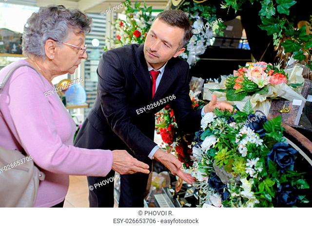 woman choosing flowers