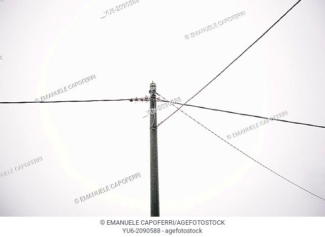 Light pole with electrical wires