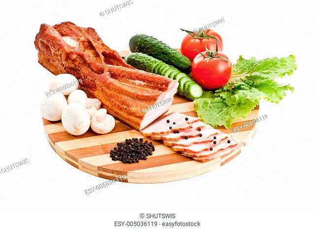 sausage on plate with vegetables