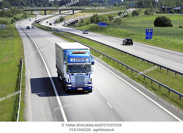 Salo, Finland. June 15, 2019. Blue-white Scania 164G L Retva Oy pulls trailer along European Route E18 in South of Finland on a sunny day of summer
