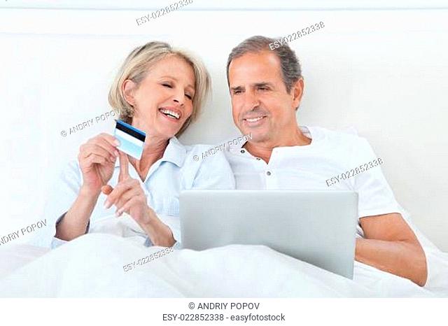 Happy Couple Shopping Online