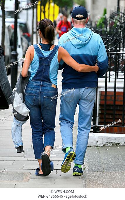 Chris Evans and his pregnant wife Natasha Shishmanian might have given away their expecting twins gender by wearing matching blue clothes