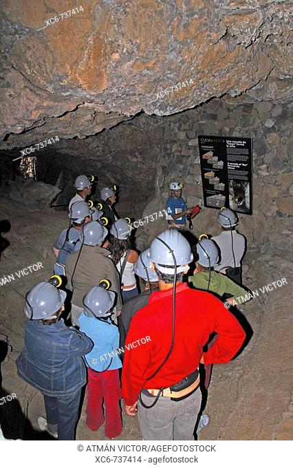 Visitors in the Cueva del Viento-Sobrado lava tube, Tenerife, Canary Islands, Spain