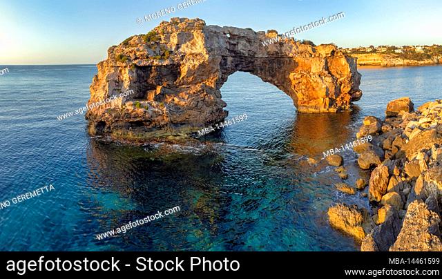 Spain, Balearic islands, Mallorca, Santanyi. Es Pontas or Mirador Es Pontas, a natural arch of rock next to the cliffs in the south east coast