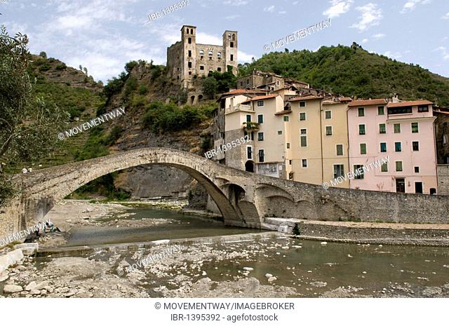 Medieval arched bridge and Castello Doria in the historic town, mountain village of Dolceacqua, Nervia Valley, Riviera, Liguria, Italy, Europe