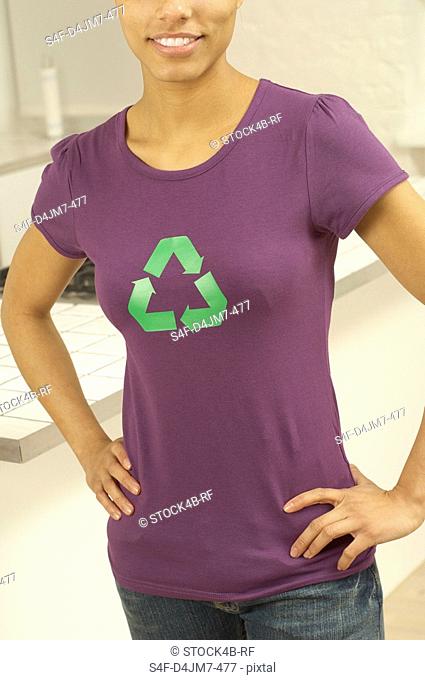 Woman with recycling symbol on t-shirt