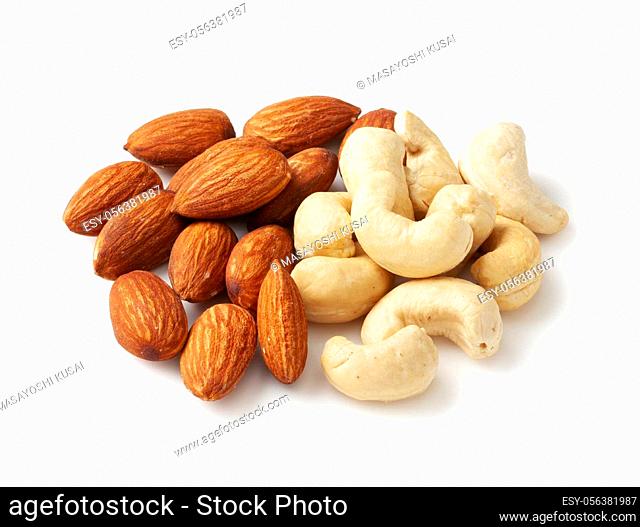 Angled shot of nuts placed on a white background