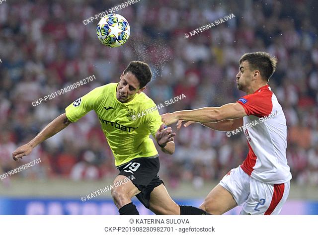 From left MARIO RONDON of CFR and DAVID HOVORKA of Slavia in action during the Football Champions' League 4th qualifying round return match: Slavia Prague vs...