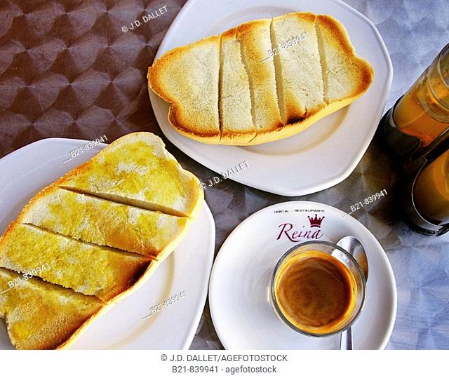 Typical Spanish breakfast: coffee and bread with olive oil. Malaga, Andalusia, Spain