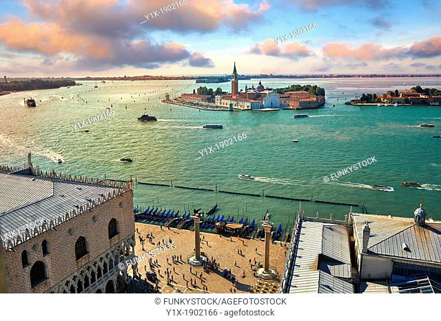 Arial view form St Mark's Campinale of St Mark's Square and the Doges with the island of San Giorgio Maggiore behind , with its church front designed by Andrea...