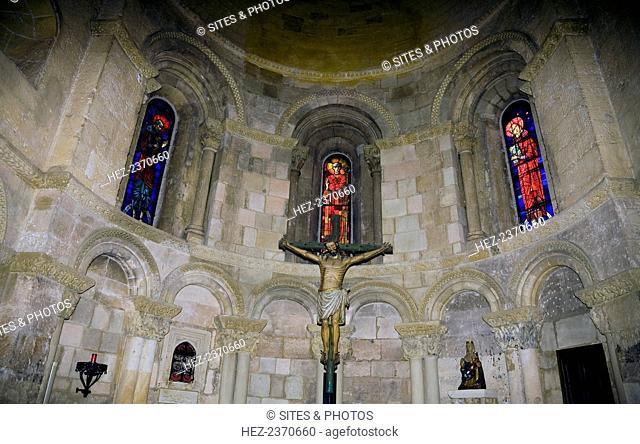 San Millan Church (Iglesia San Millan), Segovia, Spain, 2007. Crucifix and stained glass windows in the apse. Iglesia San Millan is a fine Romanesque church...