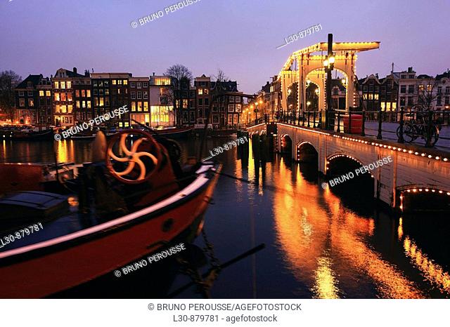 Magere Brug bridge over river Amstel, Amsterdam, The Netherlands