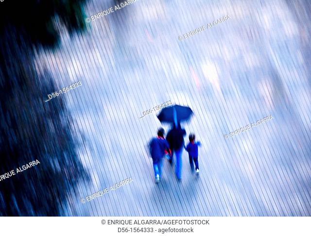 Pedestrians in the rain, Valencia, Spain