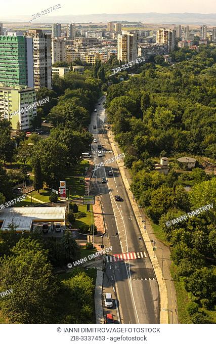 Bulgaria, Burgas. Aerial view of the high rise residential blocks from the communist era to the left and the Sea Park on the right hand side