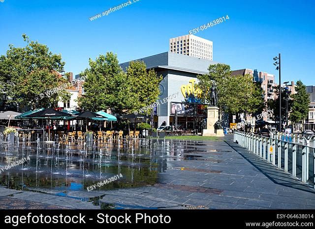 Tilburg, North Brabant, The Netherlands, September 8, 2023 - Contemporary square and fountain of the town hall