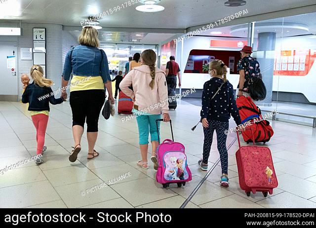 15 August 2020, Lower Saxony, Hanover: Passengers pass through the airport After classifying almost the whole of Spain, including Majorca