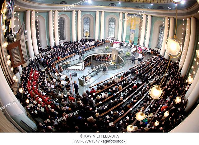 Hundreds of people attend the thanksgiving mass for Pope Benedict XVI at St. Hedwig's Cathedral in Berlin,  Germany, 28 February 2013