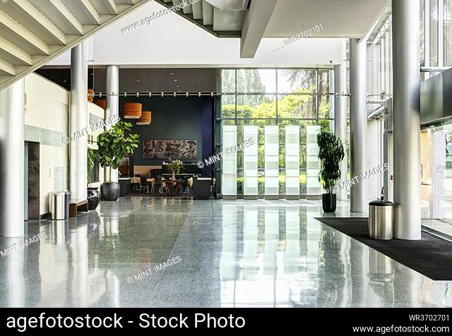 Light and airy atrium of a modern building with marble floors