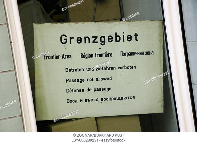 Old information sign near Checkpoint Charlie in Be