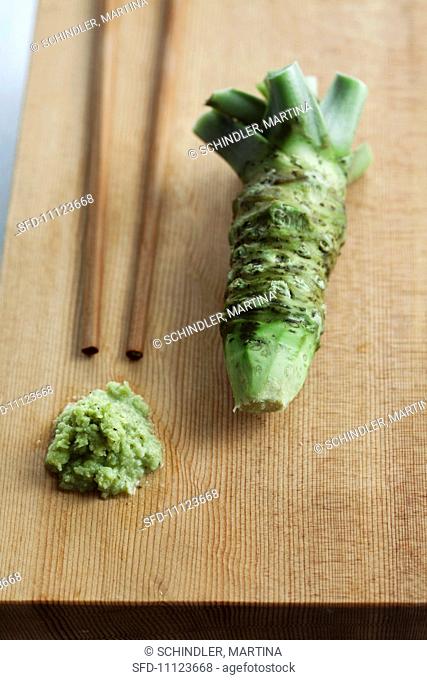 Wasabi, whole and grated, with chopsticks
