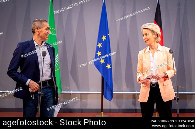 27 August 2021, Berlin: Ugur Sahin, CEO of Biontech, and Ursula von der Leyen, President of the European Commission, talk at the start of an event at the...