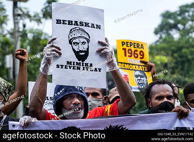 Papuan Students hold placards during a protest in in front of the Supreme Court building in Central Jakarta, Indonesia, on June 15, 2020