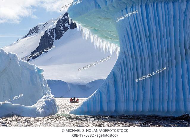 Guests from the Lindblad Expedition ship National Geographic Explorer enjoy Dorian Bay, Antarctica by Zodiac
