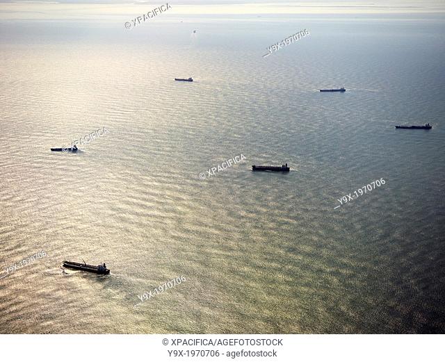 Cargo ships floating in the ocean