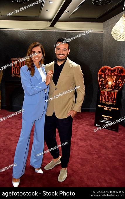 02 May 2022, North Rhine-Westphalia, Cologne: Jana Ina and Giovanni Zarrella pose for Moulin Rouge - The Musical which premieres in Cologne on 06.11